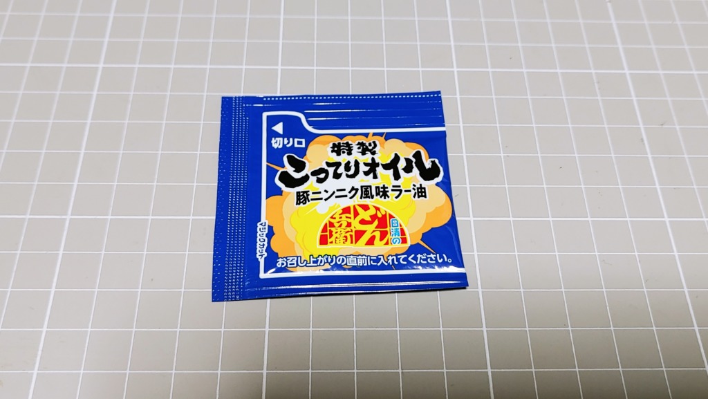 セブンイレブン 日清のどん兵衛 背脂風豚ニンニク濃厚ラー油太そば